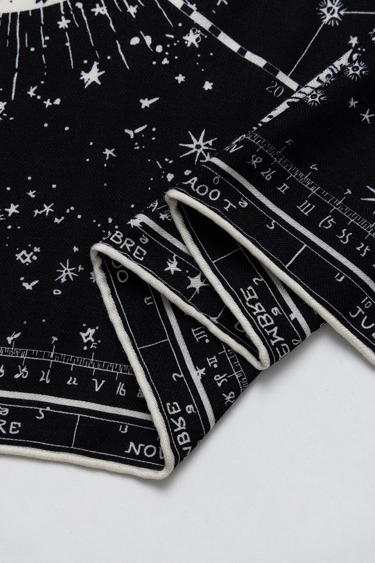Silk Wool Square Scarf - Cosmic Star Map Print | Black, 130*130cm, close-up of edge, showcasing detailed star and moon patterns, luxurious scarf.