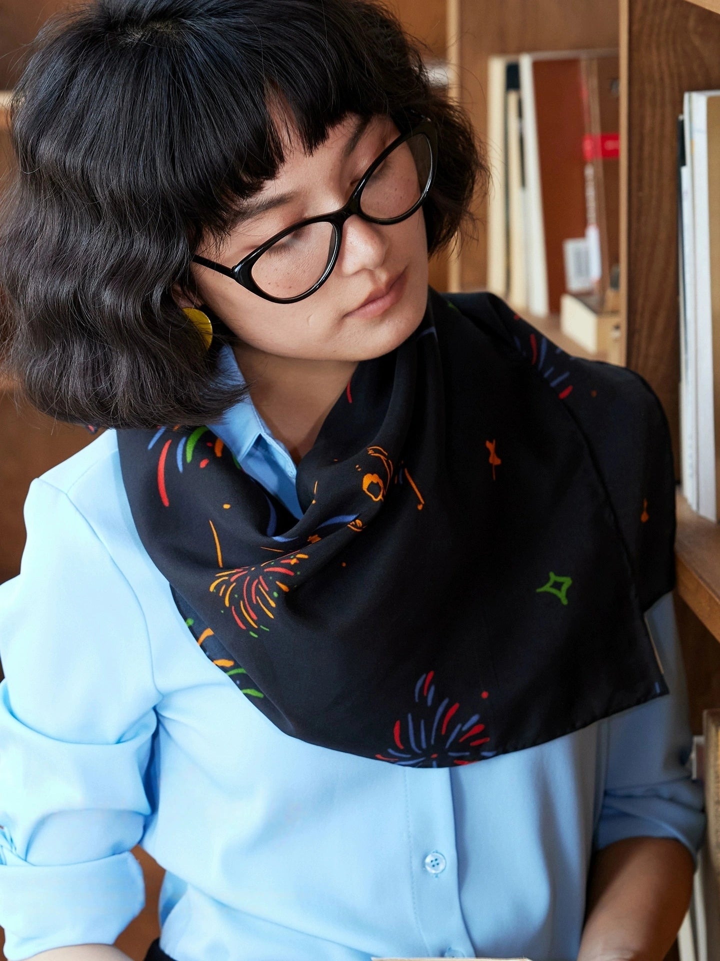 Fireworks Ballerina silk scarf styled as a neck accessory, demonstrating its elegance and versatility.