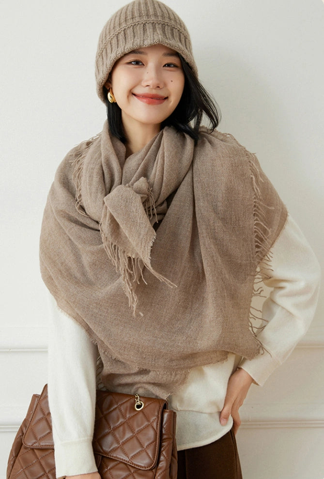 Mocha brown oversized cashmere scarf, styled as a chic shawl for women.