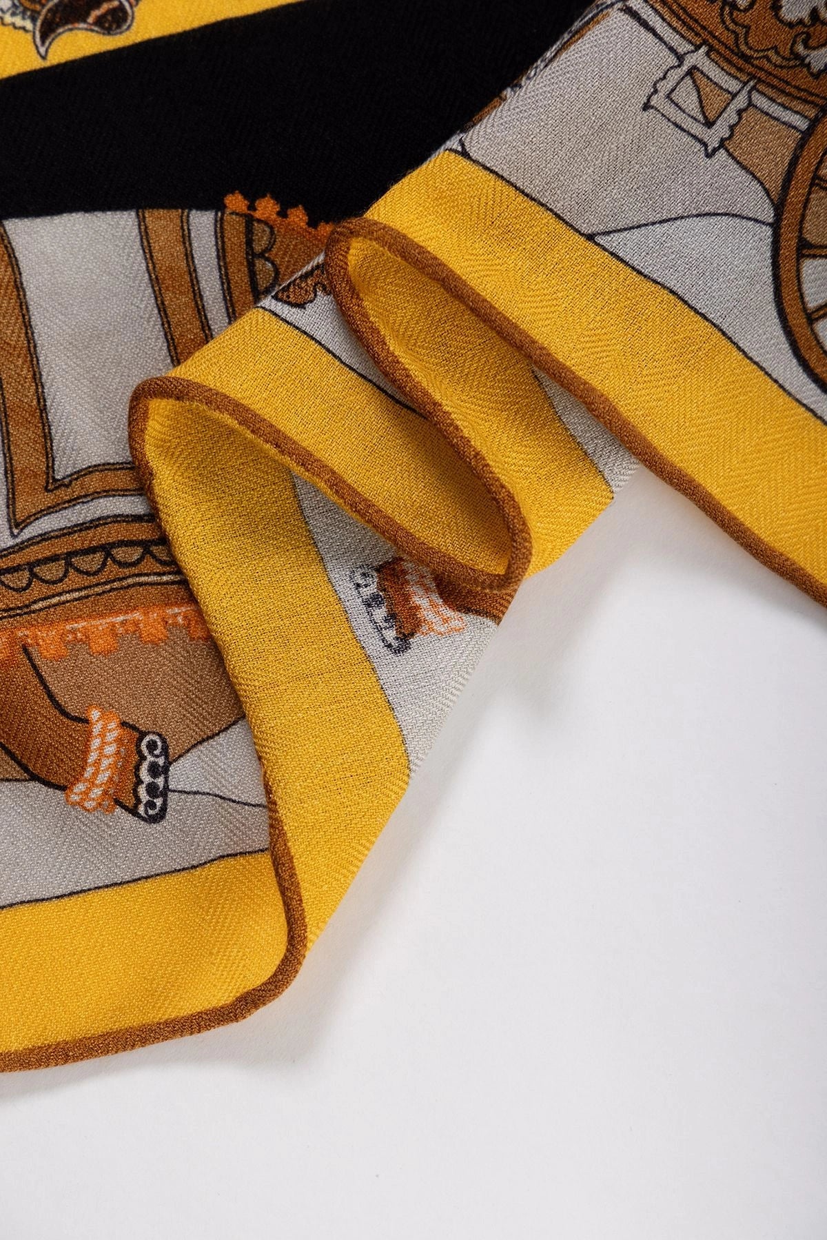 Silk Wool Square Scarf - Persimmon Tree Print | Yellow, 130*130cm, close-up of folded edge, highlighting intricate floral and carriage motifs, elegant style. 
