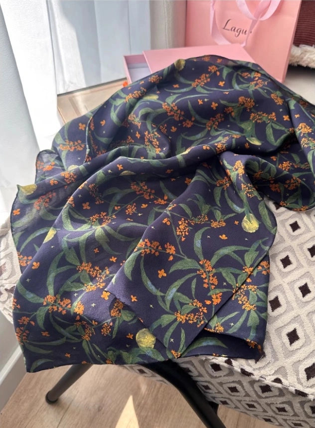 Dark blue osmanthus floral silk square scarf, 100% mulberry silk, displayed flat to highlight its intricate floral design.
